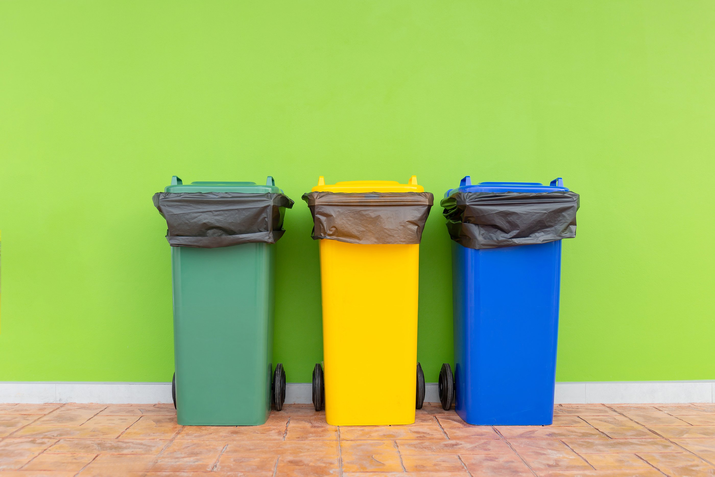 bigstock-Group-Of-Colorful-Recycle-Bins-389681464